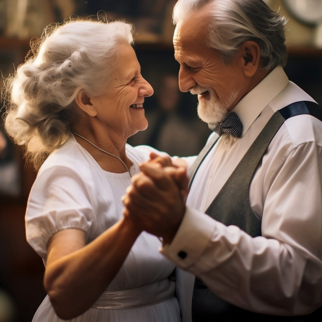 Para seniorów tańczą trzymają się za ręce